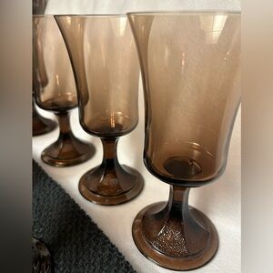 7 Fostoria “Misty Brown” wine glasses. 6.75”
